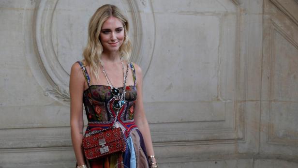 Fashion blogger Chiara Ferragni poses during a photocall before the Spring/Summer 2018 women&#039;s ready-to-wear collection show for fashion house Dior during Paris Fashion Week, France, September 26, 2017. REUTERS/Philippe Wojazer